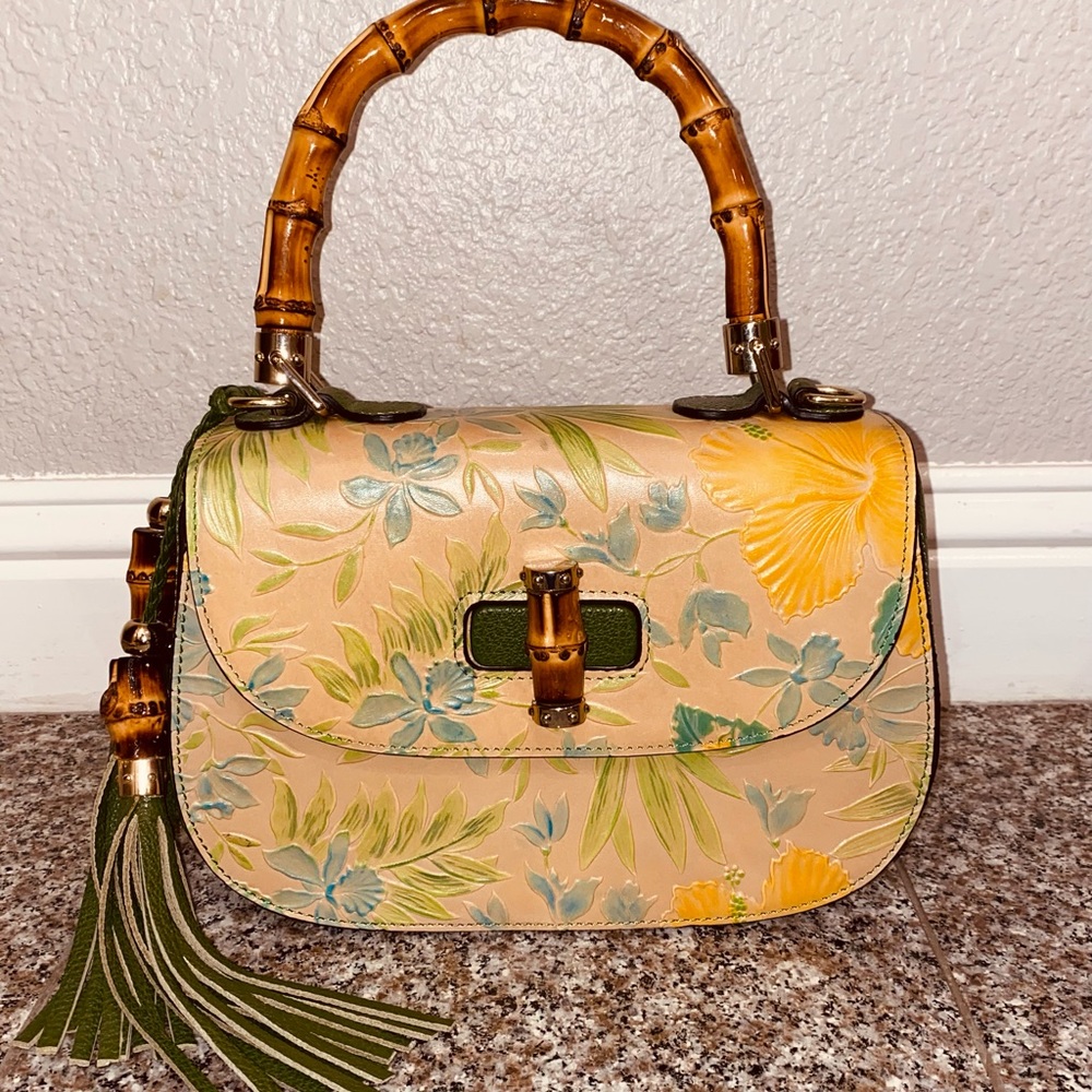 Hand made leather handbag with bamboo handles